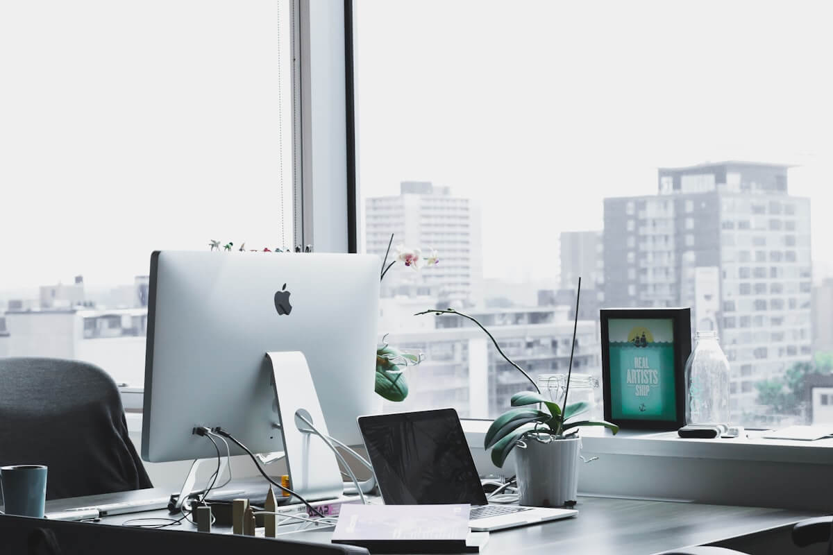 Modern office workspace with developers collaborating